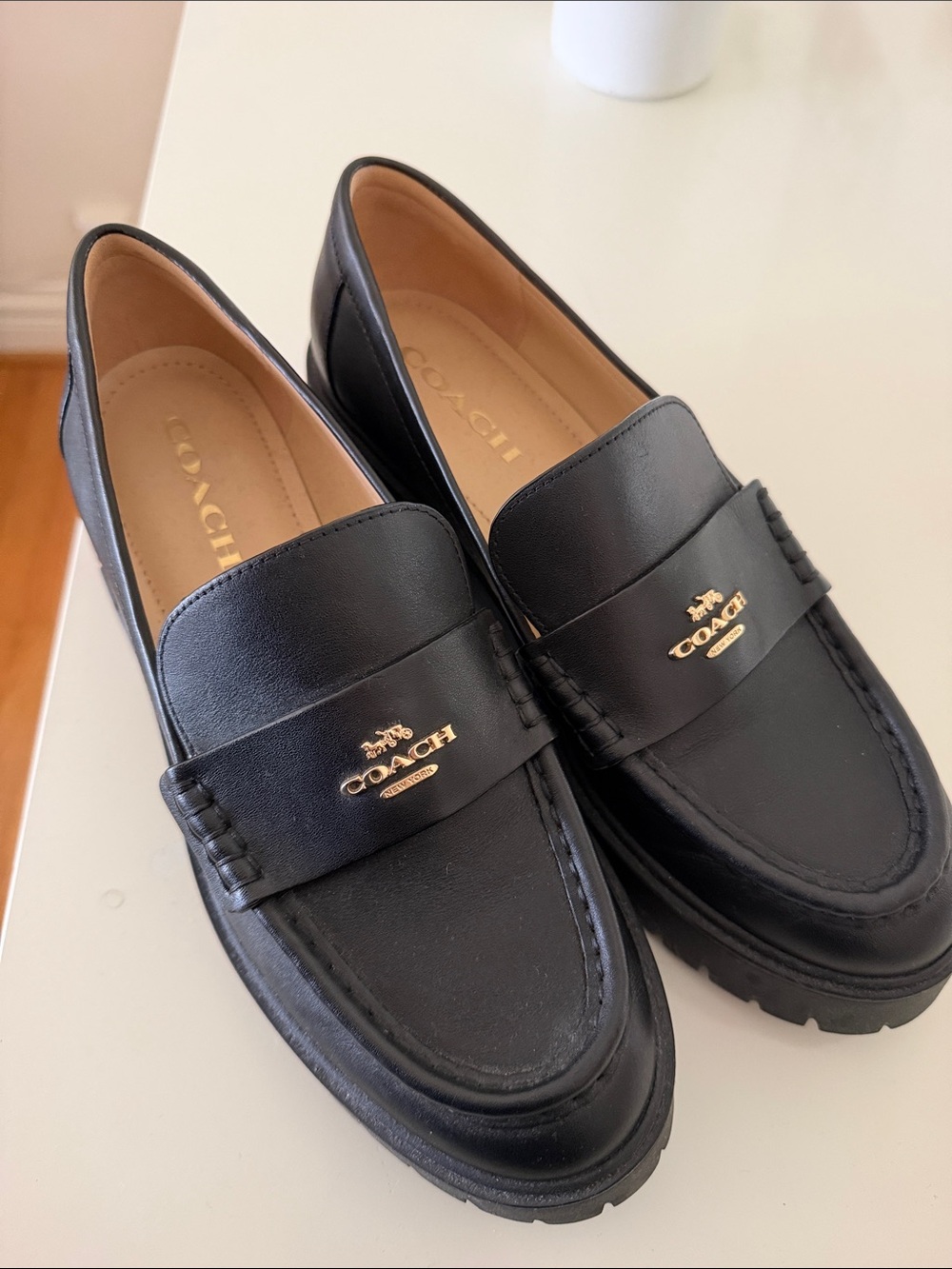 COACH Black Leather Penny Loafers with Gold Logo